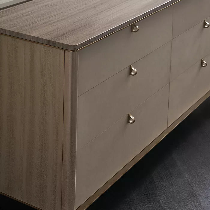 Elegant 6-Drawer Dresser with Travertine Stone Top and Bronze Accents – Modern Showroom Sample